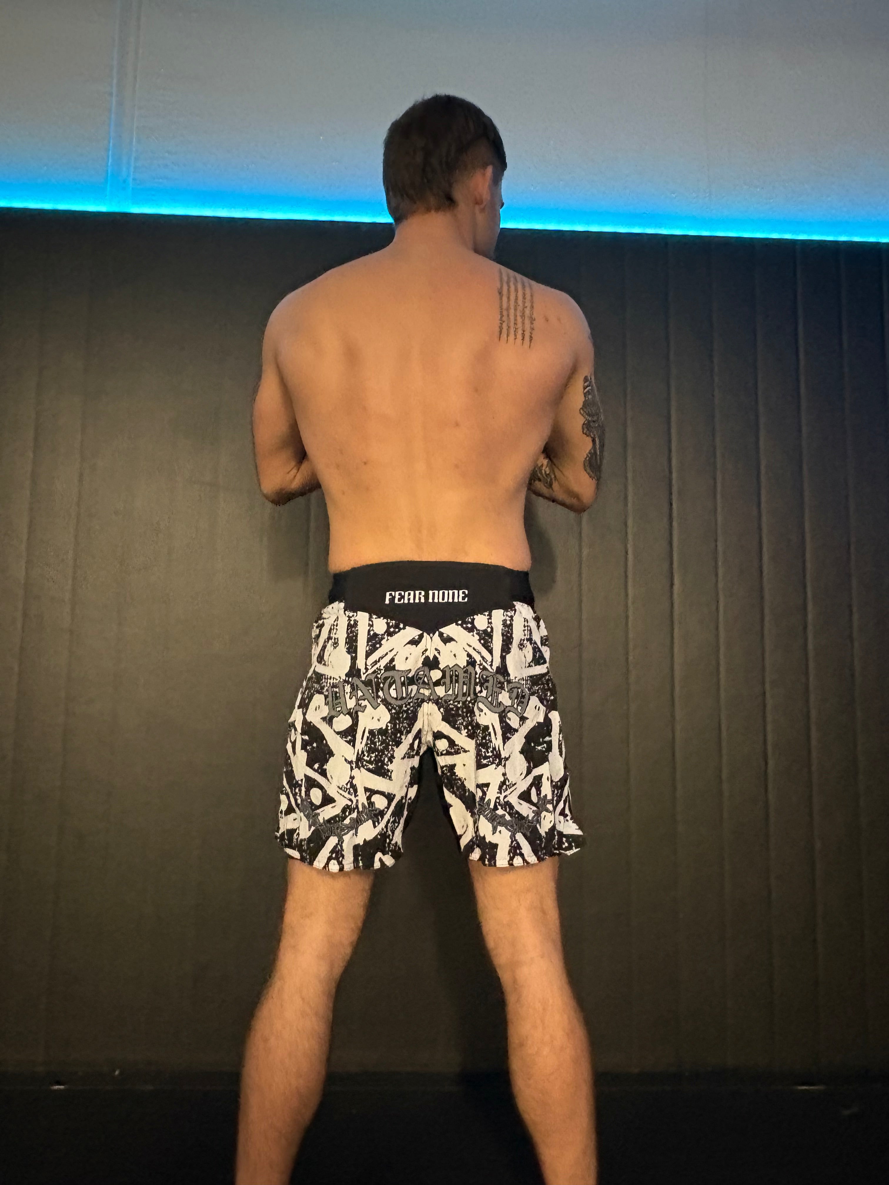 “FEAR NONE” high-cut MMA shorts