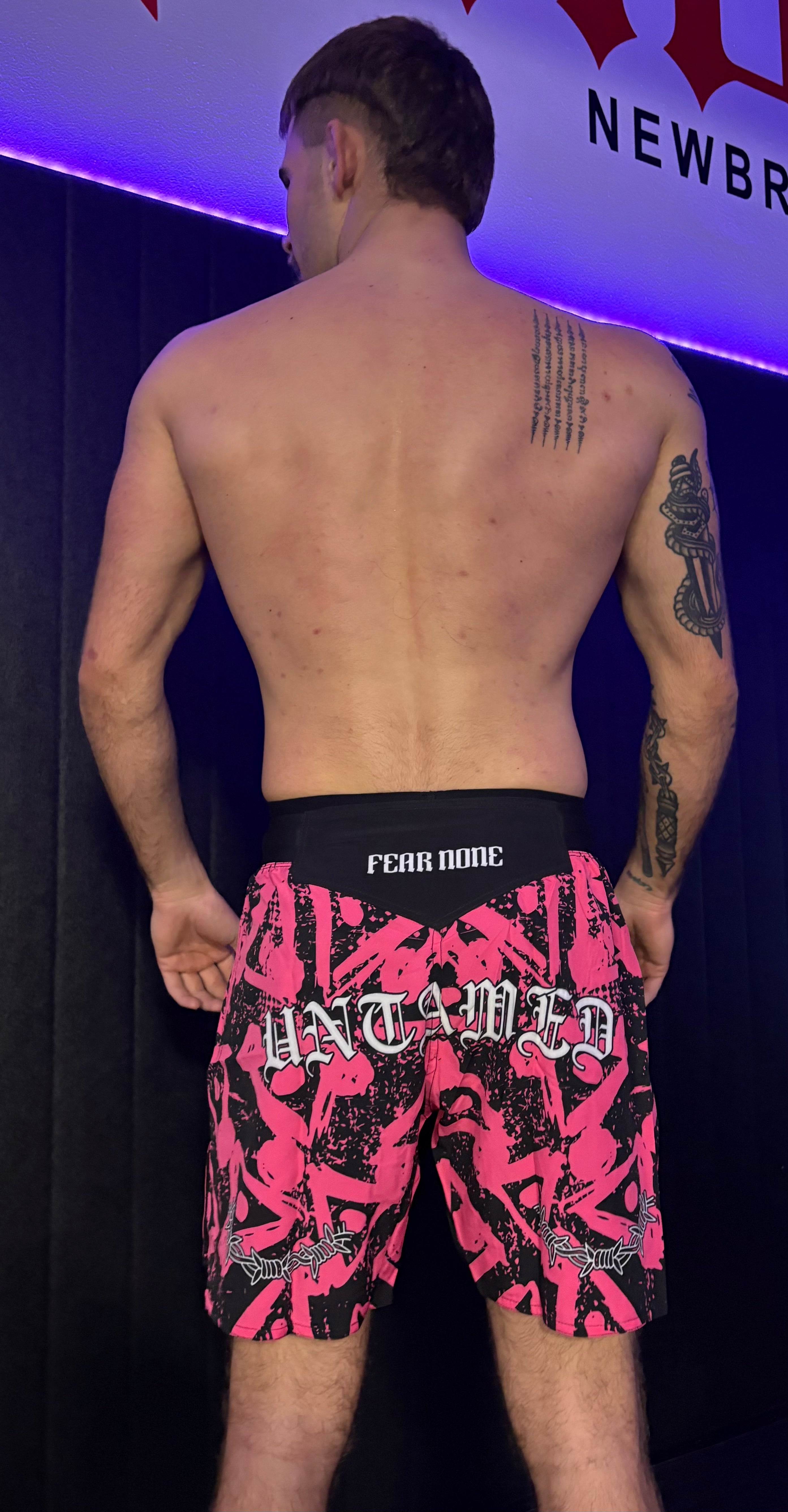 “FEAR NONE” high-cut MMA shorts