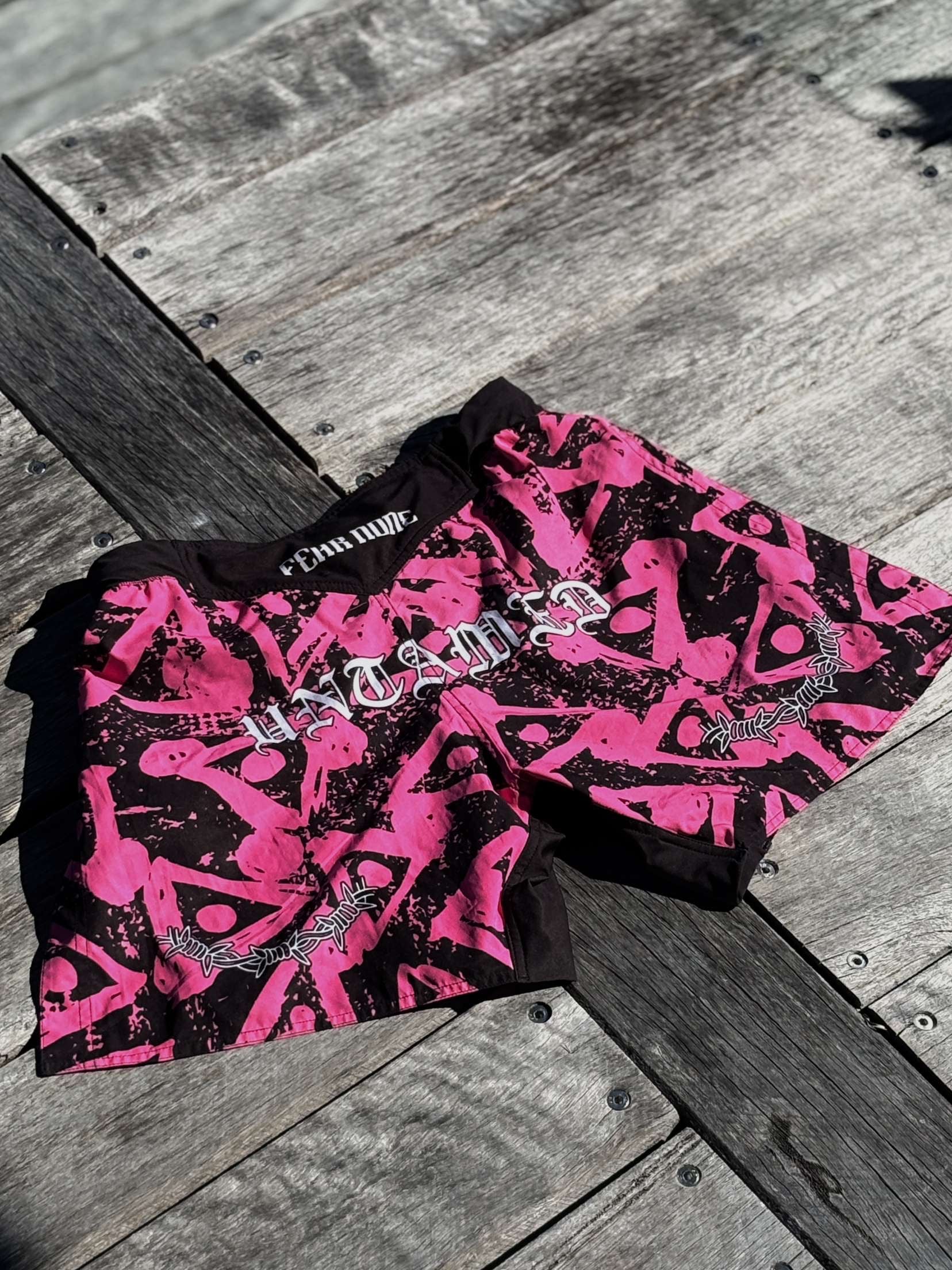 “FEAR NONE” high-cut MMA shorts